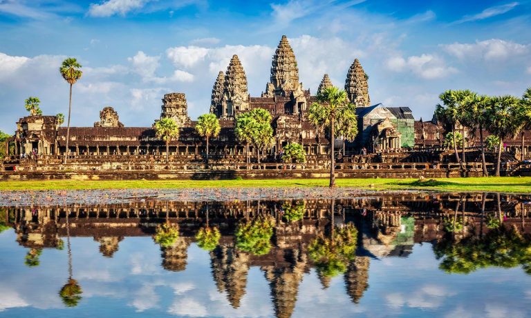 Angkor Wat temple reflected in water, Cambodia