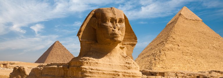 Great Sphinx with pyramids of Menkaure and Khafre in background, Giza, Egypt