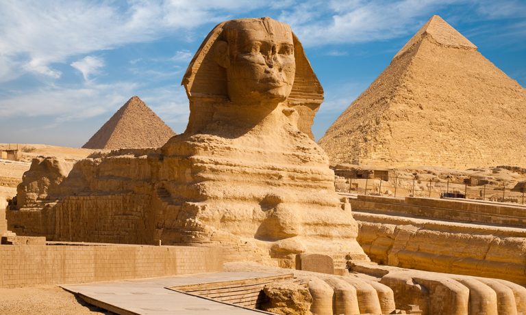 Great Sphinx with pyramids of Menkaure and Khafre in background, Giza, Egypt